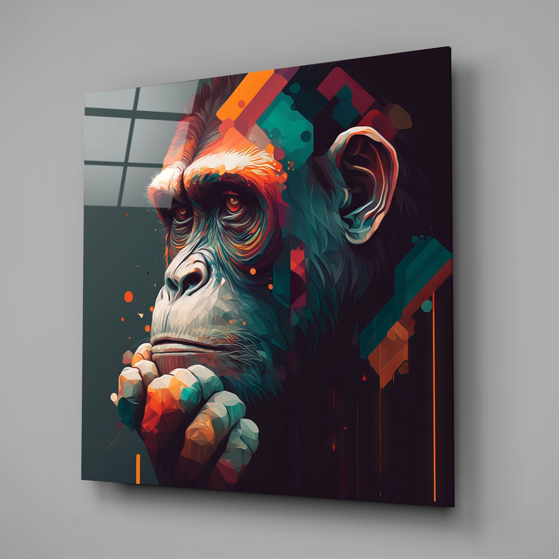 Colorful glass wall art featuring a contemplative chimpanzee with geometric patterns in orange, teal, and red, displayed at an angle on gray background.