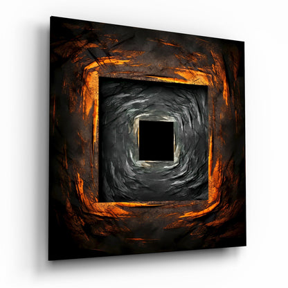 Square glass wall art featuring concentric square frames with orange-gold outer edges fading to gray and black toward a dark center void.