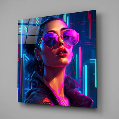 Angled view of neon-lit glass wall art featuring a woman with pink-tinted sunglasses against cyan and magenta geometric backgrounds.
