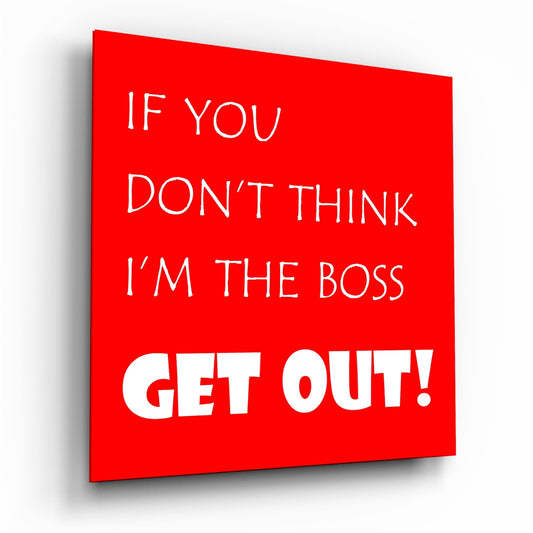 Red glass wall art panel displayed at an angle showing white text reading "If you don't think I'm the boss get out!