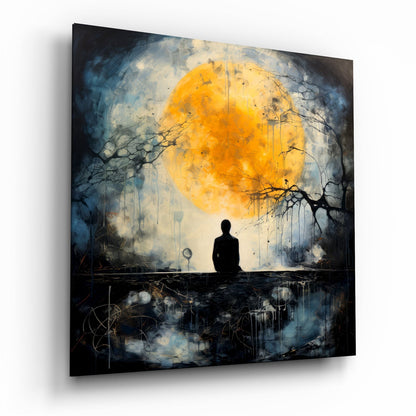 Silhouetted figure sitting by water gazing at large golden moon surrounded by dark trees and blue-toned atmosphere on glass panel.