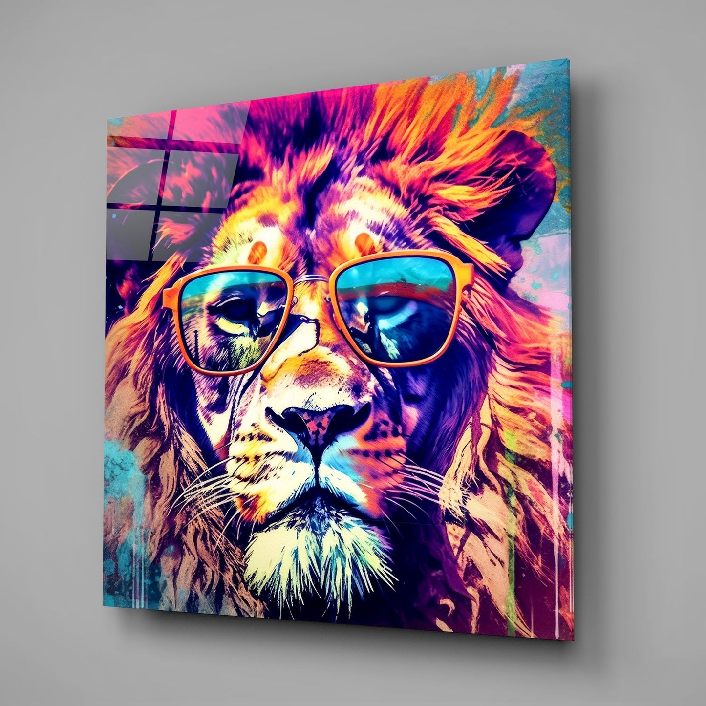 Colorful glass wall art featuring a lion wearing sunglasses with vibrant neon pink, yellow, and blue hues displayed at an angle.