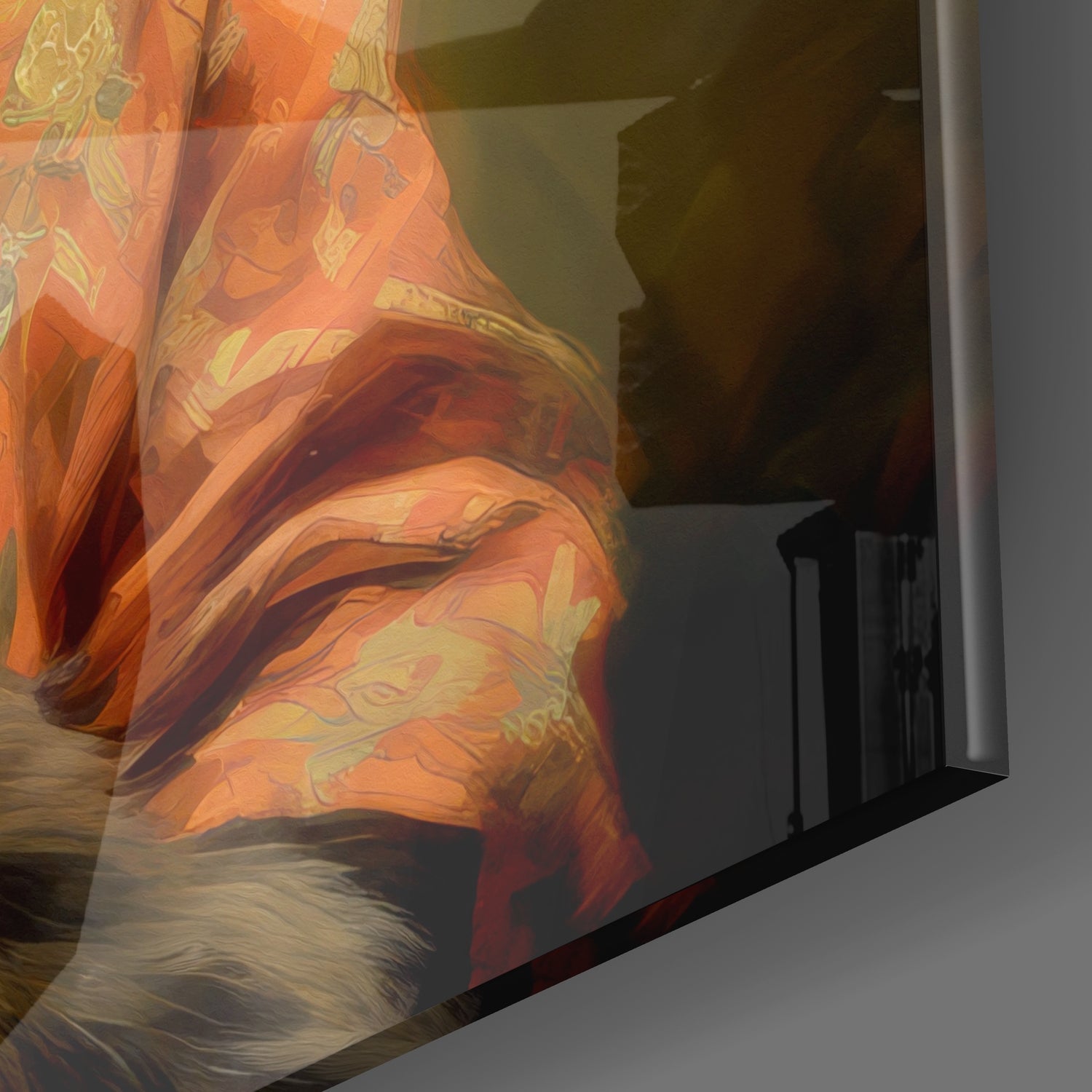 Close-up of orange and red painted glass wall art displaying stylized cat face with flowing fur details and decorative patterns.
