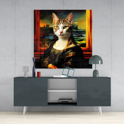 Glass wall art depicting a cat with human face in Renaissance style painting, displayed above gray media console in modern interior setting.