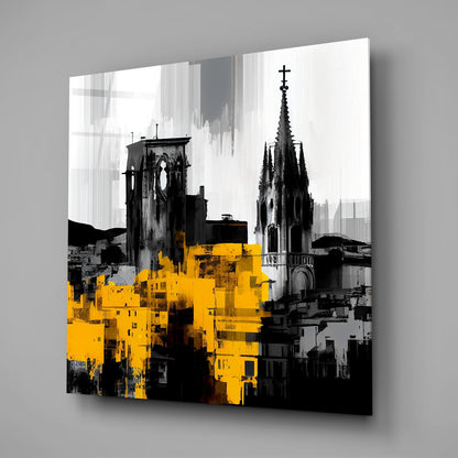 Black and white cityscape with yellow architectural overlay on glass wall art, displayed at an angle against gray background.