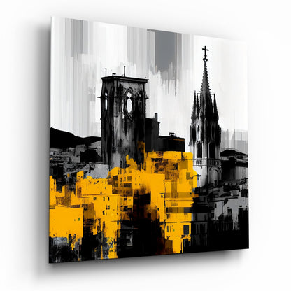 Black and white cityscape with Gothic church spires and yellow building silhouettes on glass wall art, angled three-quarter view.