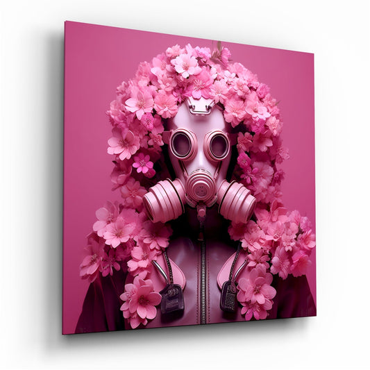 Pink gas mask surrounded by pink flowers against matching pink background, displayed as angled glass wall art panel.