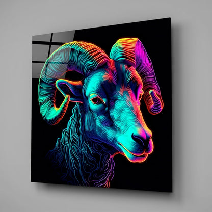 Neon-colored ram head glass wall art with vibrant cyan, magenta, and yellow gradient lines on black background, displayed at an angle.