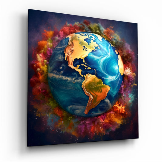 Colorful glass globe with blue oceans and tan continents surrounded by vibrant red, orange, and yellow powder clouds on dark background.
