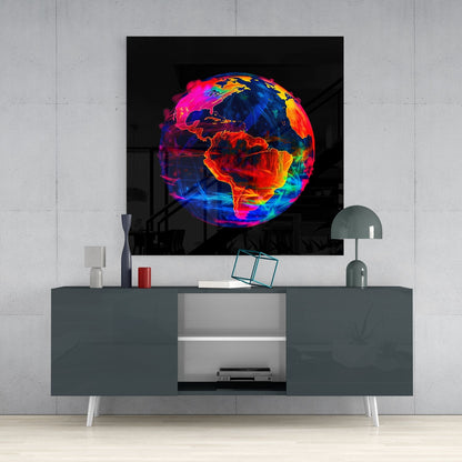 Vibrant neon Earth glass wall art displaying colorful continents in reds, oranges, blues, and greens mounted above a gray console table.