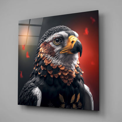Angled view of glass wall art featuring a bald eagle portrait with golden beak and eyes against red and dark background.