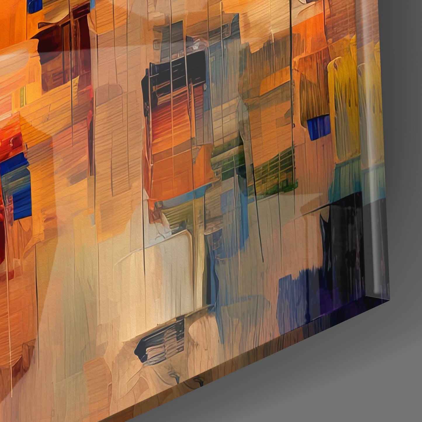 Angled perspective of translucent glass wall art displaying warm orange and cool blue architectural interior reflections.