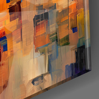 Angled perspective of translucent glass wall art displaying warm orange and cool blue architectural interior reflections.