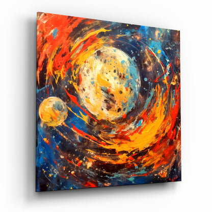 Angled perspective of glass wall art depicting a luminous planet with swirling orange, red, and blue abstract brushstrokes and a smaller celestial body.