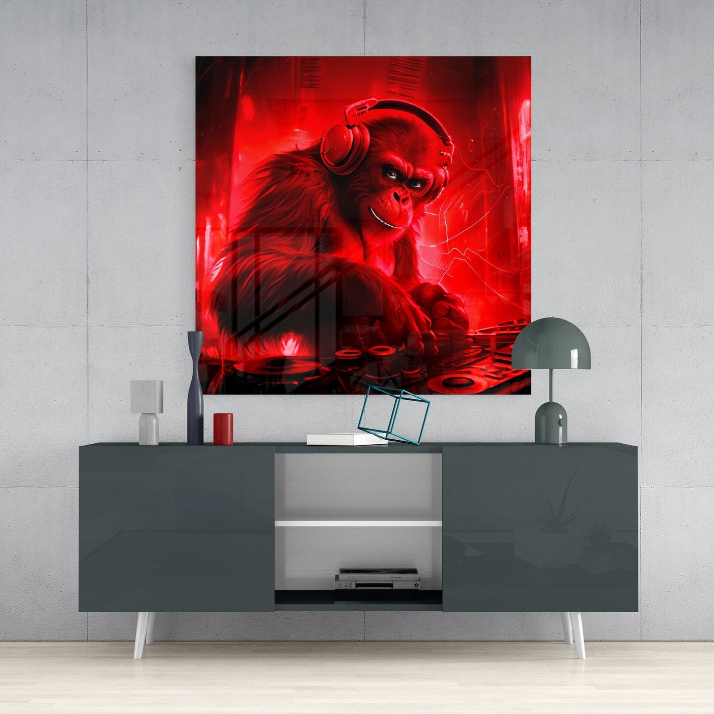 Red neon glowing monkey wearing headphones displayed above gray media console in modern interior setting.