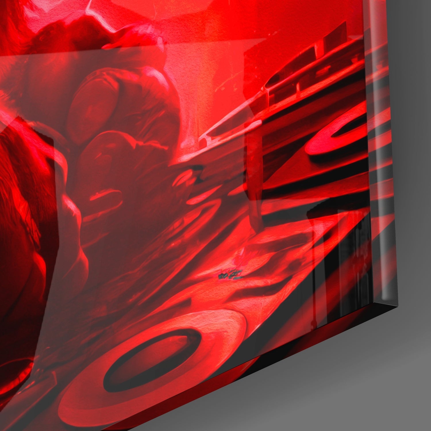 Red neon-glowing glass yo-yo wall art displayed at an angled perspective against gray background.