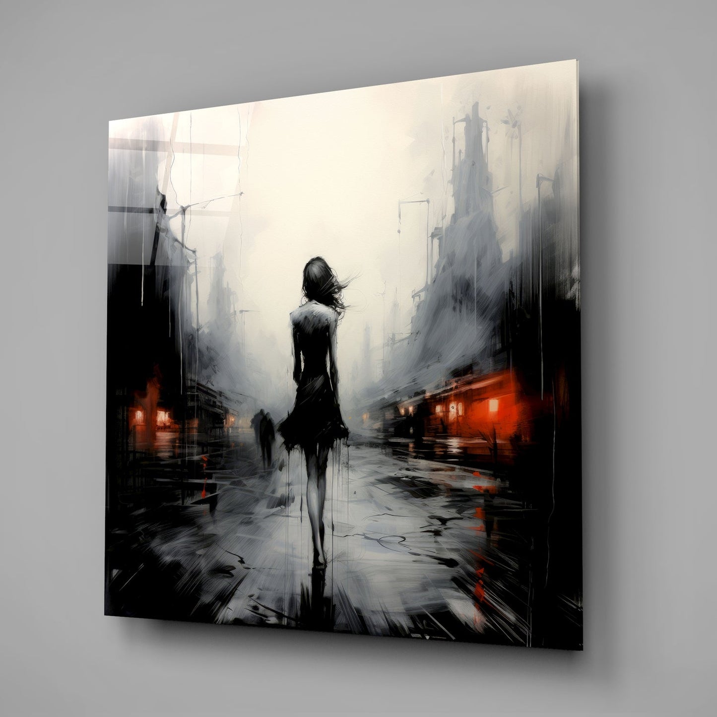 A glass wall art panel displaying a solitary silhouetted figure standing in a misty urban street with red lights and towering buildings.