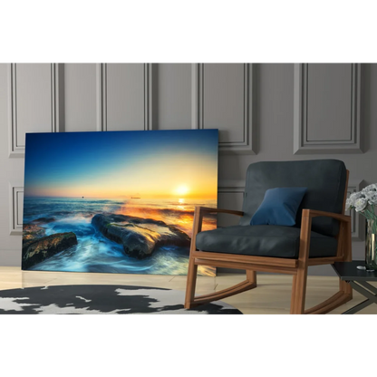 Vibrant sunset ocean glass wall art with golden sky waves