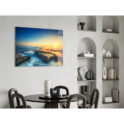 Vibrant sunset ocean waves on sleek glass wall art panel