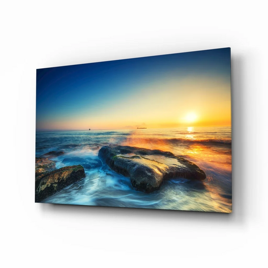 Vibrant sunset ocean waves glass wall art with golden sky and crashing waves