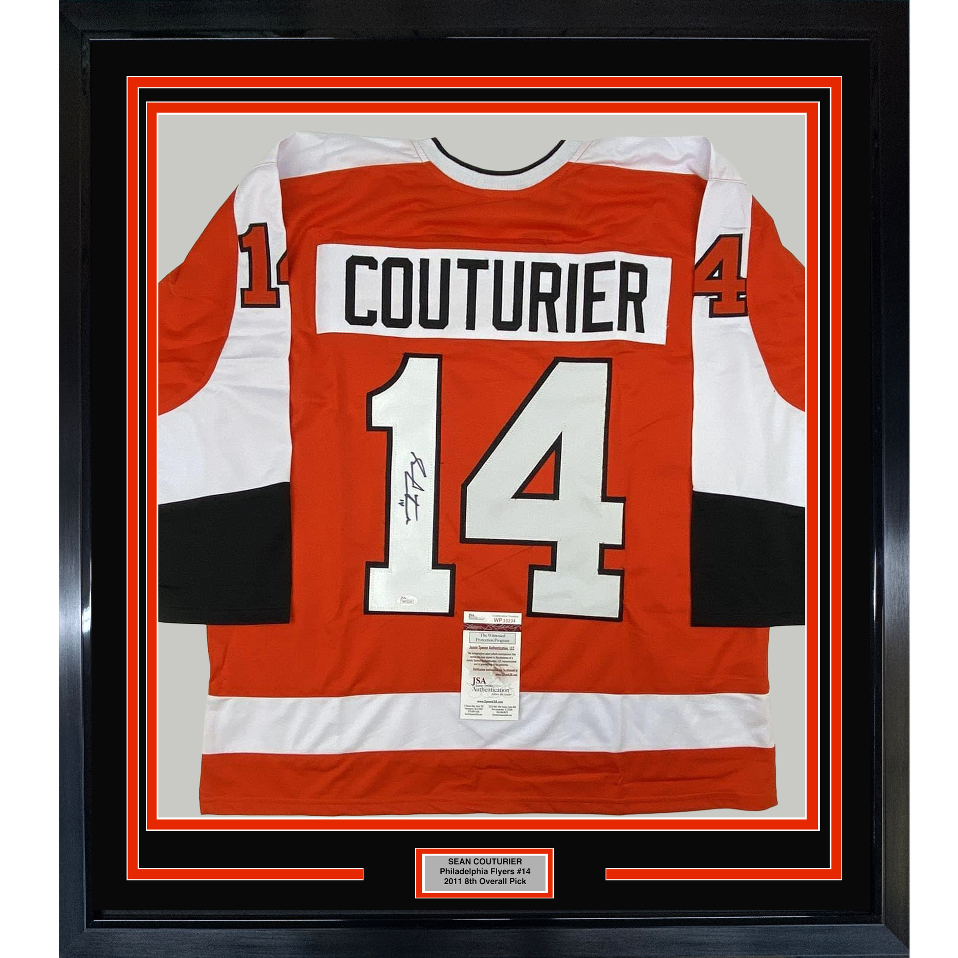 Framed orange and white Philadelphia Flyers jersey number 14 with "COUTURIER" nameplate and JSA authentication certificate visible.