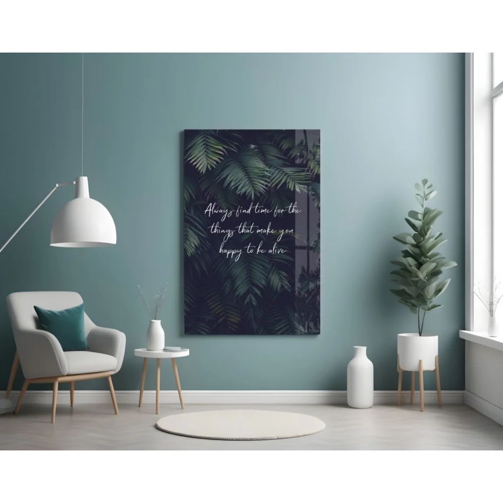 Tropical leaf glass wall art with happiness quote on teal wall