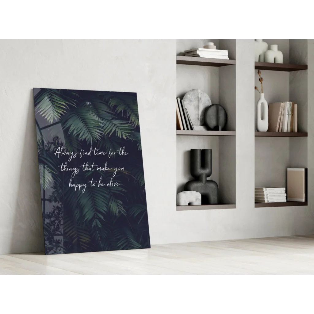 Tropical leaf glass wall art with lush green palm fronds and happiness quote