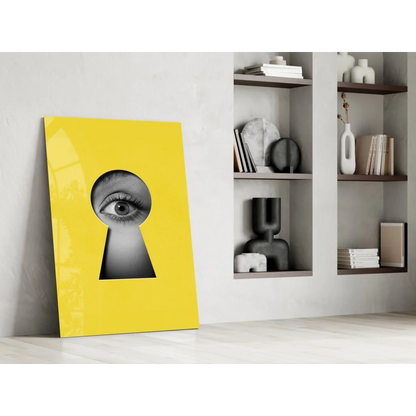 Vibrant yellow canvas keyhole eye glass wall art with bold black-and-white gaze