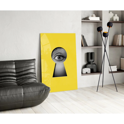 Vibrant yellow canvas keyhole eye glass wall art with bold black-and-white eye