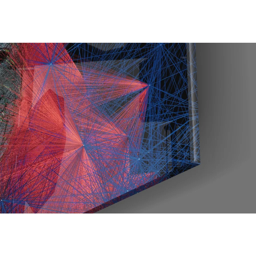 Vibrant red and blue geometric glass wall art on dark canvas
