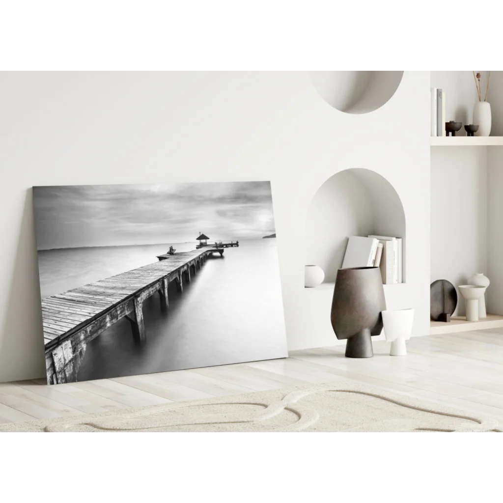 Black-and-white serene pier canvas wall art with calm waters