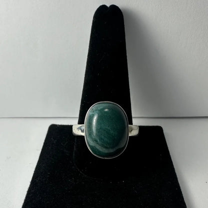 Silver serpentine ring with oval green aventurine in bezel setting