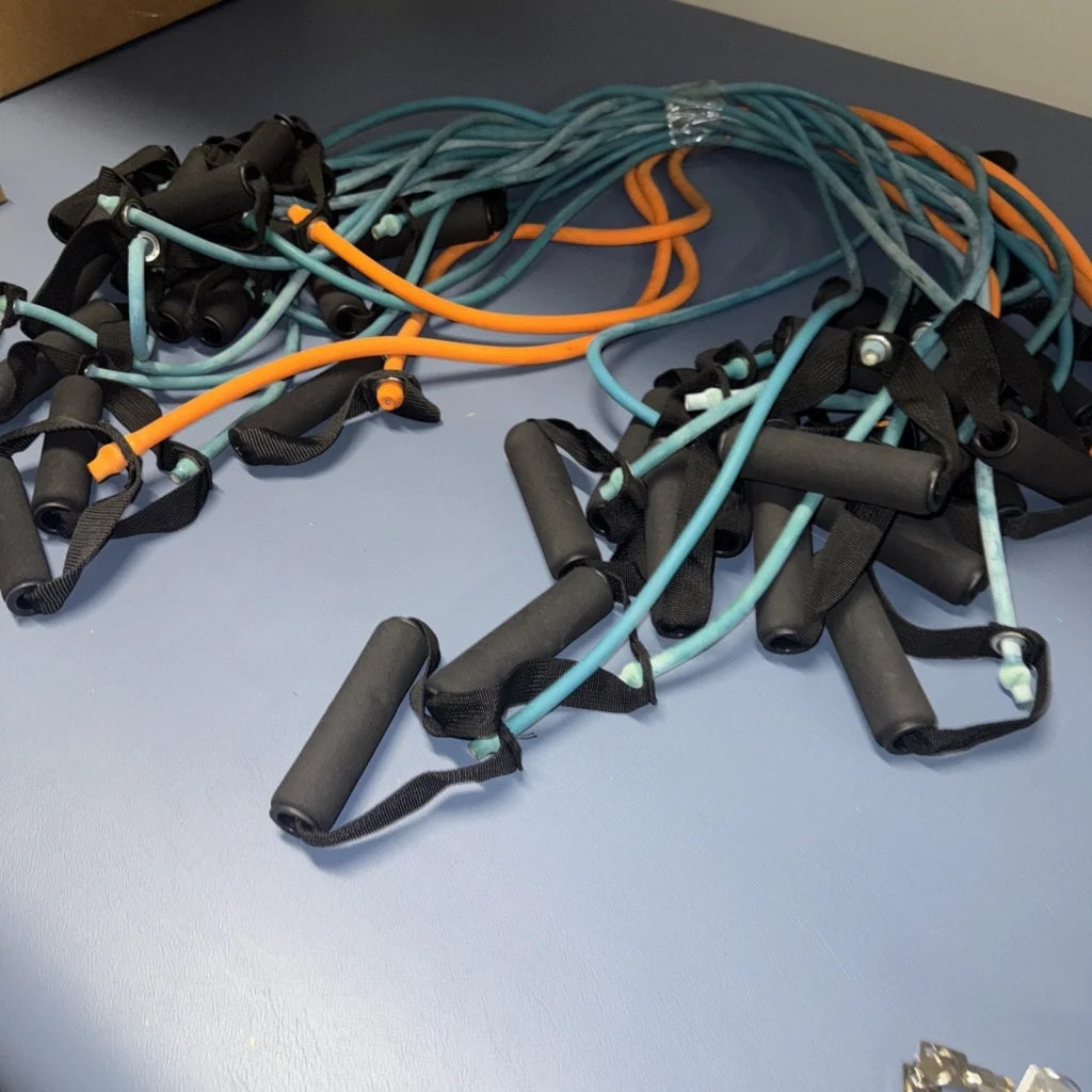 Set of 18 fitness resistance bands with handles, teal and orange cords