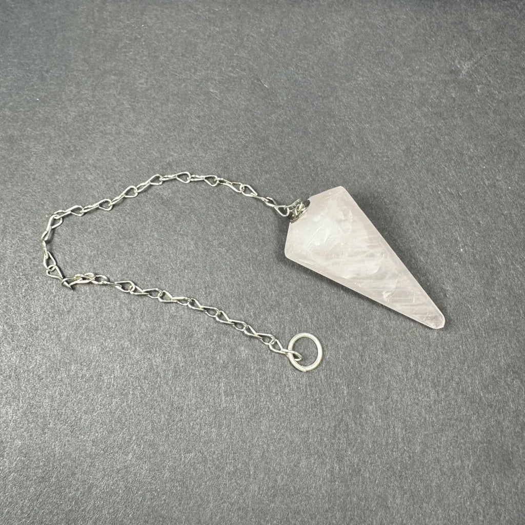 Translucent pink rose quartz stone pendulum with silver chain