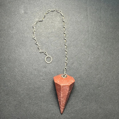 Reddish-brown faceted hematite stone pendulum on silver chain from Seven set