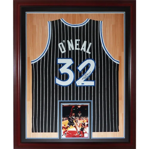 Shaq signed deluxe framed jersey with black white striped ONeal nameplate
