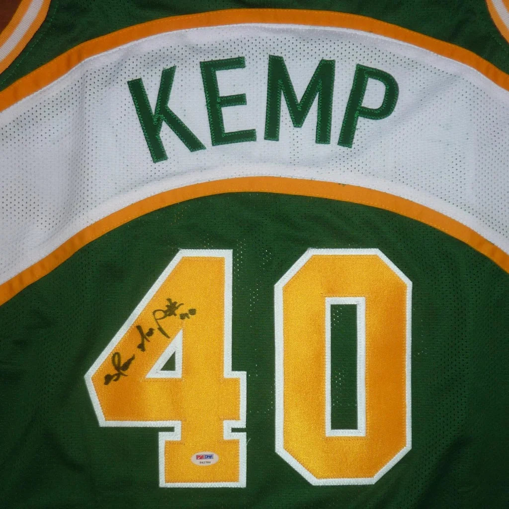 Shawn Kemp autographed green and gold Seattle jersey with Kemp and number 40