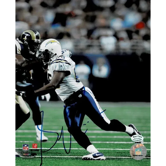 Autographed Shawn Phillips San Diego Chargers football photo on green field with COA