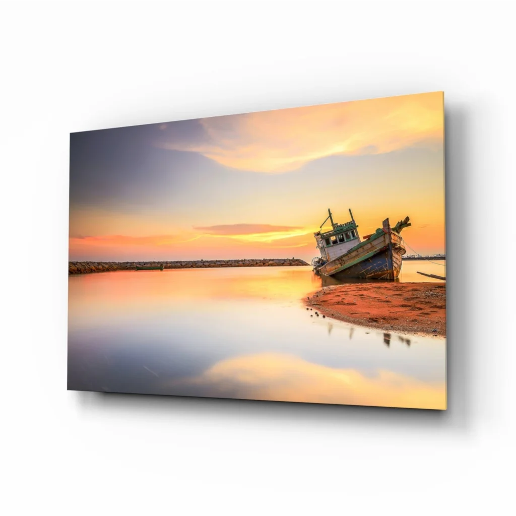 Weathered fishing boat on shore at sunset in glass wall art print