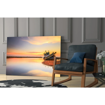 Weathered fishing boat on calm water at sunset, glass wall art print