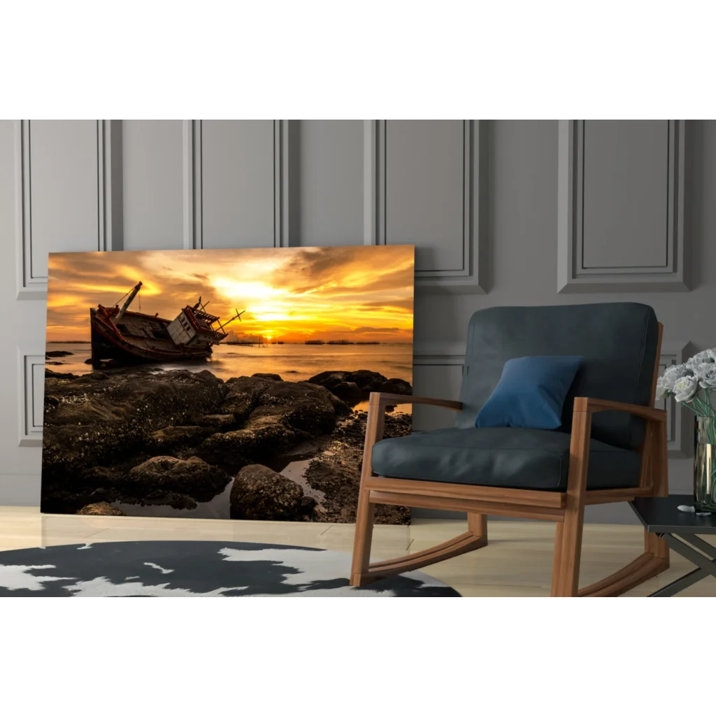 Stunning sunset shipwreck on glass wall art, orange hues over water