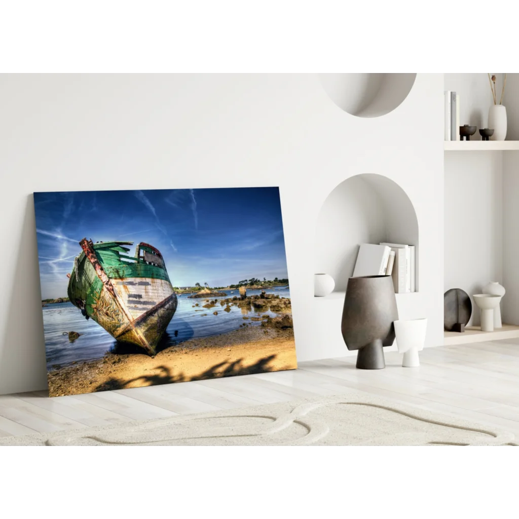 Weathered green boat on sandy shore glass wall art print