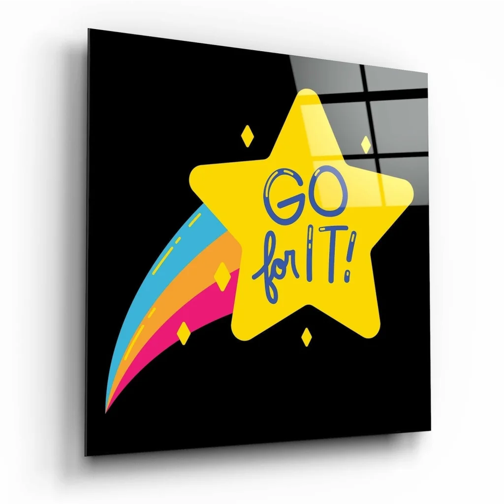 Vibrant yellow shooting star glass wall art with rainbow trail and Go For It message