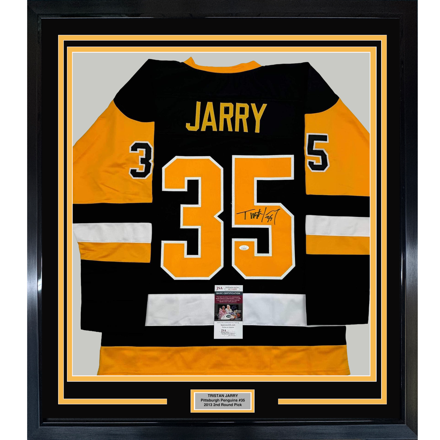 Framed black and gold Pittsburgh Penguins jersey #35 with "JARRY" name and autograph displayed against gray matting with JSA authentication certificate.