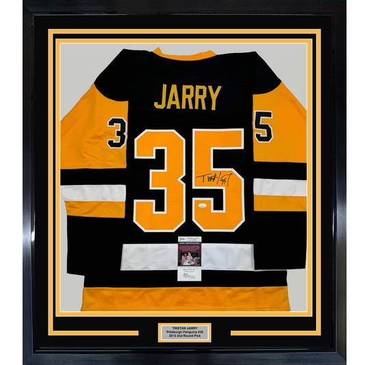 Framed black and gold Pittsburgh Penguins jersey #35 with "JARRY" name and autograph displayed against gray matting with JSA authentication certificate.