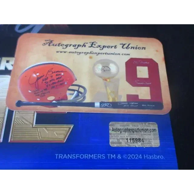 Signed 8x10 photo EUA with authenticated football helmet, trophy, jersey, and bat