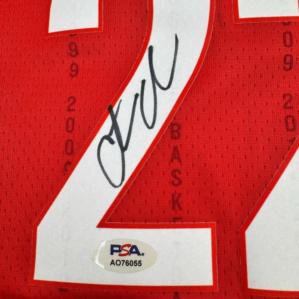 Signed red Nike basketball jersey #21 by Caitlin Clark