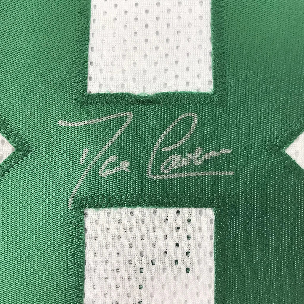 Autographed green and white custom jersey from Professional Sports League era