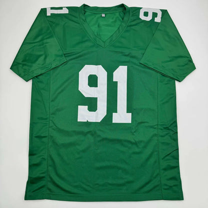 Green signed custom jersey with white 91 number from professional sports league