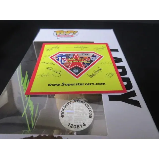 Autographed Signed Funko Pop U2 Larry Mullen Jr collectible figure in display box with certification stickers